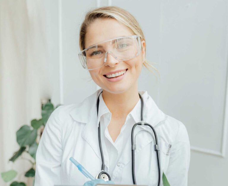 Doctor with safety glasses